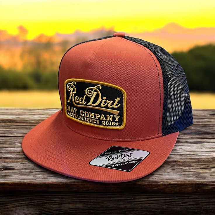 This Red Dirt Hat Co. snapback is burnt orange with black mesh has the flat bill style and features a patch with gold writing. Burnt Orange Front Black Mesh Back 5 Panel Red Dirt Patch Adjustable Snapback Flat Bill 08.24 Gold Writing, Snap Back Hat, Red Dirt, Red Panels, Western Store, Cowgirl Western, Western Hats, Snap Backs, Ball Cap