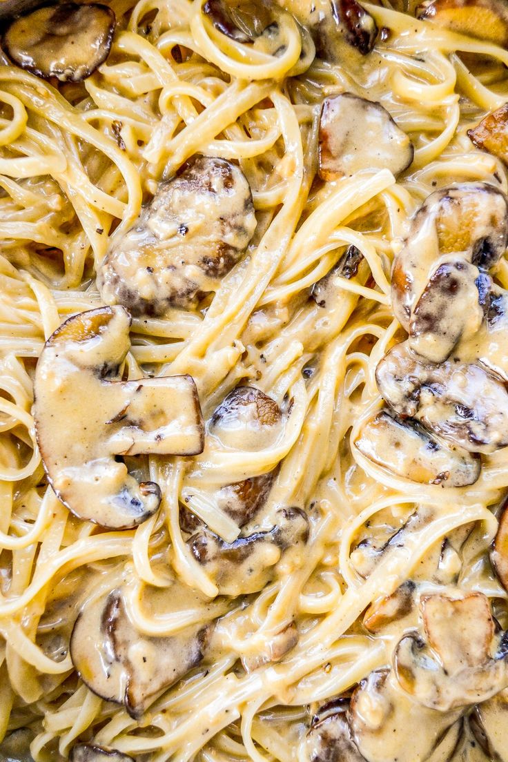 pasta with mushrooms and sauce in a pan