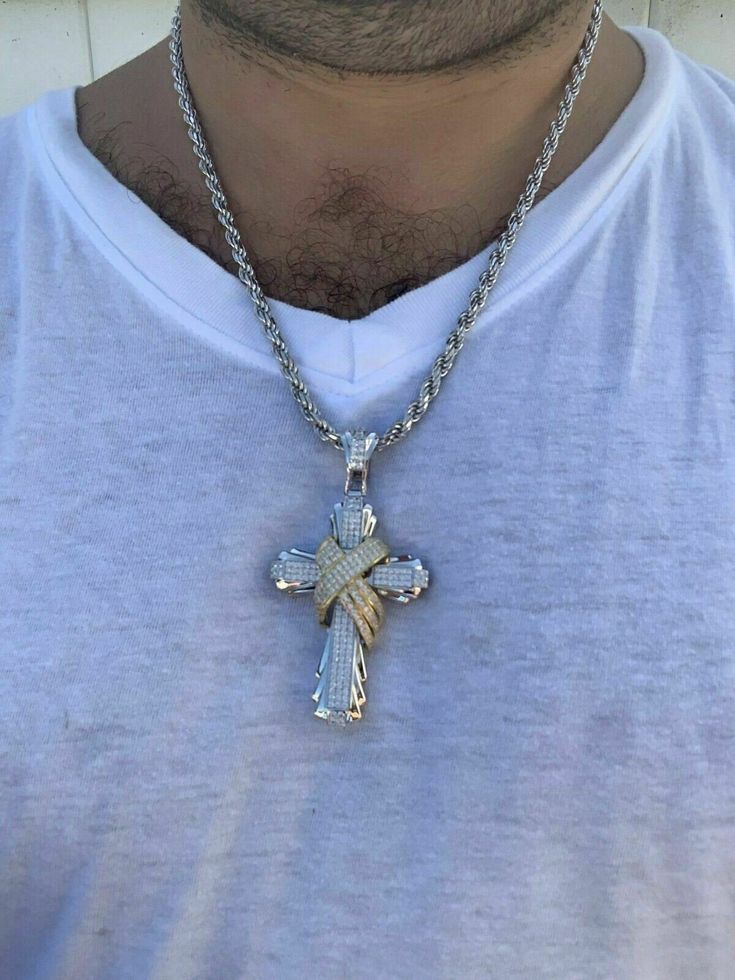 "Men's Custom Made Super Iced Out HEAVY Cross Pendant! Solid 925 sterling silver We have 3 styles! Rhodium finished, two-toned, & 14k yellow gold finished! Color lasts many years!! Measures roughly 2.5\" by 1.5\" ..weighs roughly 25 grams 200 micropaved handset simulated diamonds (CZ) for a total of 3ct! 100% 925 silver...not plated or filled...will NEVER TARNISH OR CHANGE COLOR LISTING IS FOR PENDANT ONLY, CHAIN NOT INCLUDED Bale fits most chains up to 8mm thick!" White Gold Diamond Jewelry With Shiny Finish, Silver Diamond Necklace With Rope Chain, Fine Jewelry In White Gold With Shiny Finish, White Gold Pendant Jewelry With Shiny Finish, White Gold Pendant With Shiny Finish, White Gold Shiny Pendant Jewelry, Gold Sterling Silver Jewelry With Rope Chain, Silver Pendant With Rope Chain, Silver Pendant Rope Chain Jewelry