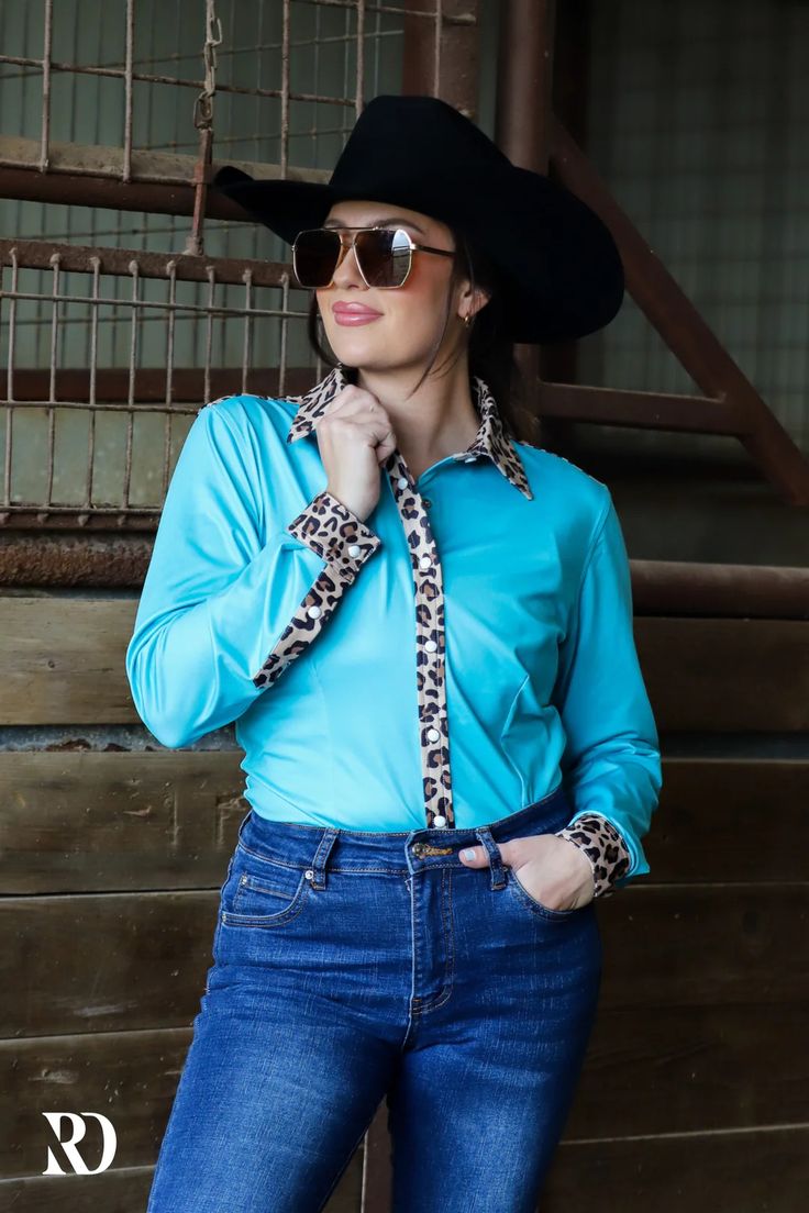 LEOPARD AND TURQ PERFORMANCE RODEO SHIRT (ADULT) – Ranch Dress'n Blue Stretch Shirt For Fall, Fitted Casual Shirt For Rodeo, Casual Fitted Shirt For Rodeo, Blue Western Tops For Fall, Blue Western Style Tops For Fall, Fitted Turquoise Long Sleeve Tops, Fitted Blue Shirt For Fall, Blue Western Tops For Rodeo, Fitted Turquoise Tops For Fall