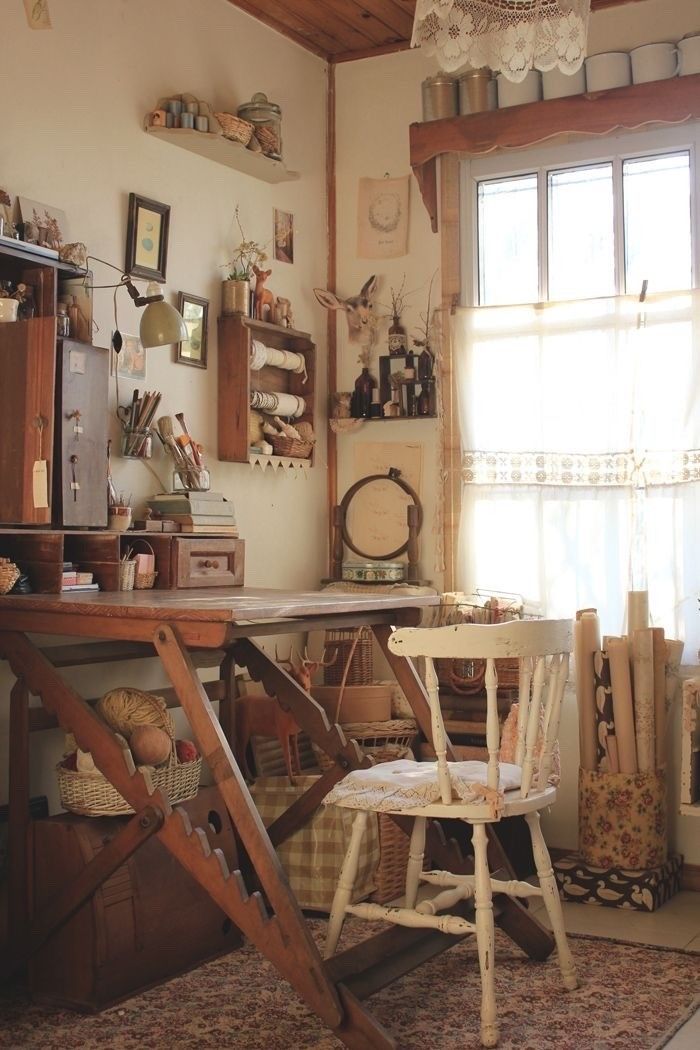 an old fashioned desk and chair in a room