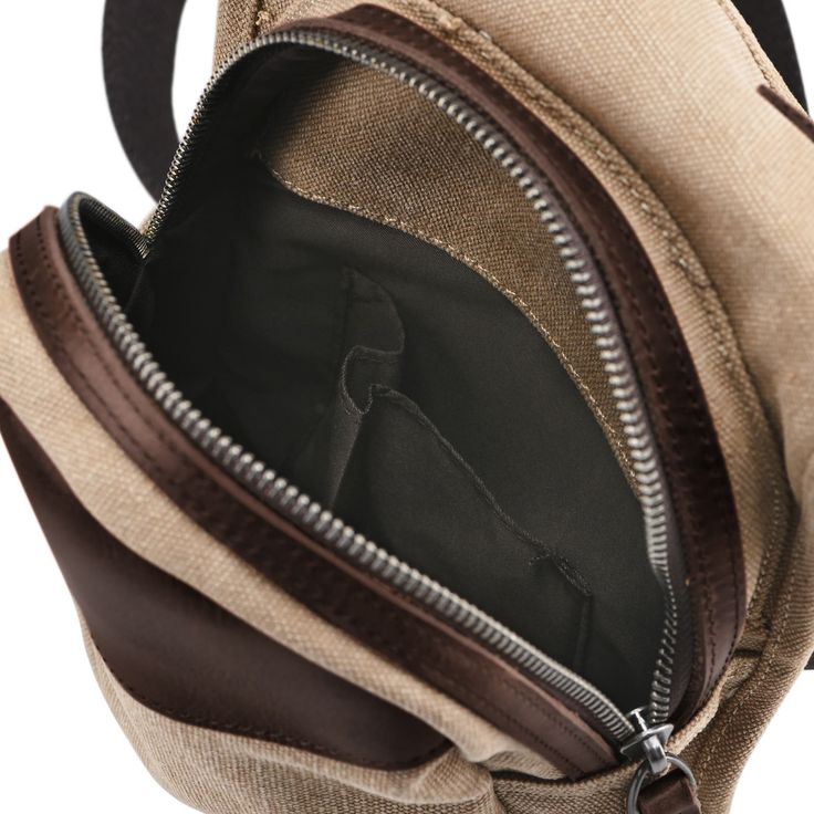 This gorgeous men's bag from Convey features high quality canvas and genuine leather. The centre has a main zippered compartment, with smaller pockets for other odds and ends. Finished with an adjustable shoulder strap. Crossbody Bags With Canvas Lining For Outdoor, Everyday Canvas Chest Bag, Outdoor Shoulder Bag With Leather Trim And Coated Canvas, Outdoor Crossbody Bag With Canvas Lining, Daily Use Canvas Chest Bag With Zipper Closure, Travel Coated Canvas Crossbody Bag, Everyday Carry Bags With Leather Trim And Waxed Canvas, Beige Travel Chest Bag With Zipper Pocket, Beige Chest Bag With Zipper Pocket For Travel