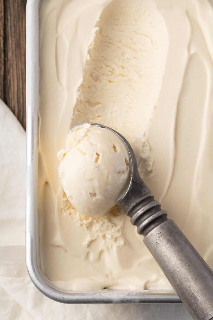 a scoop of ice cream in a metal container