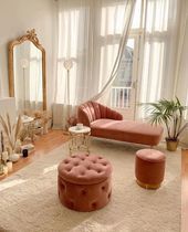 the instagram page on instagram shows an image of a living room with pink furniture and