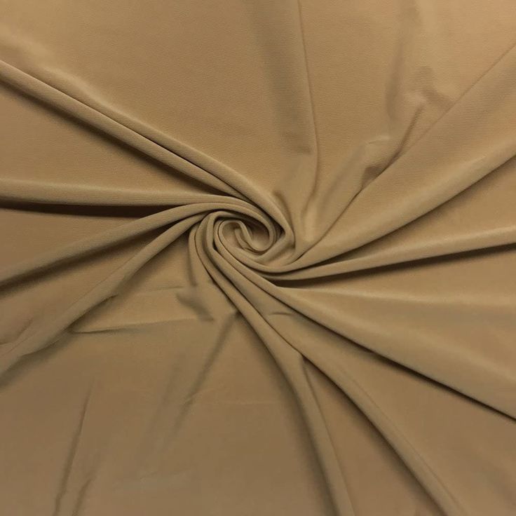 a close up view of a tan fabric