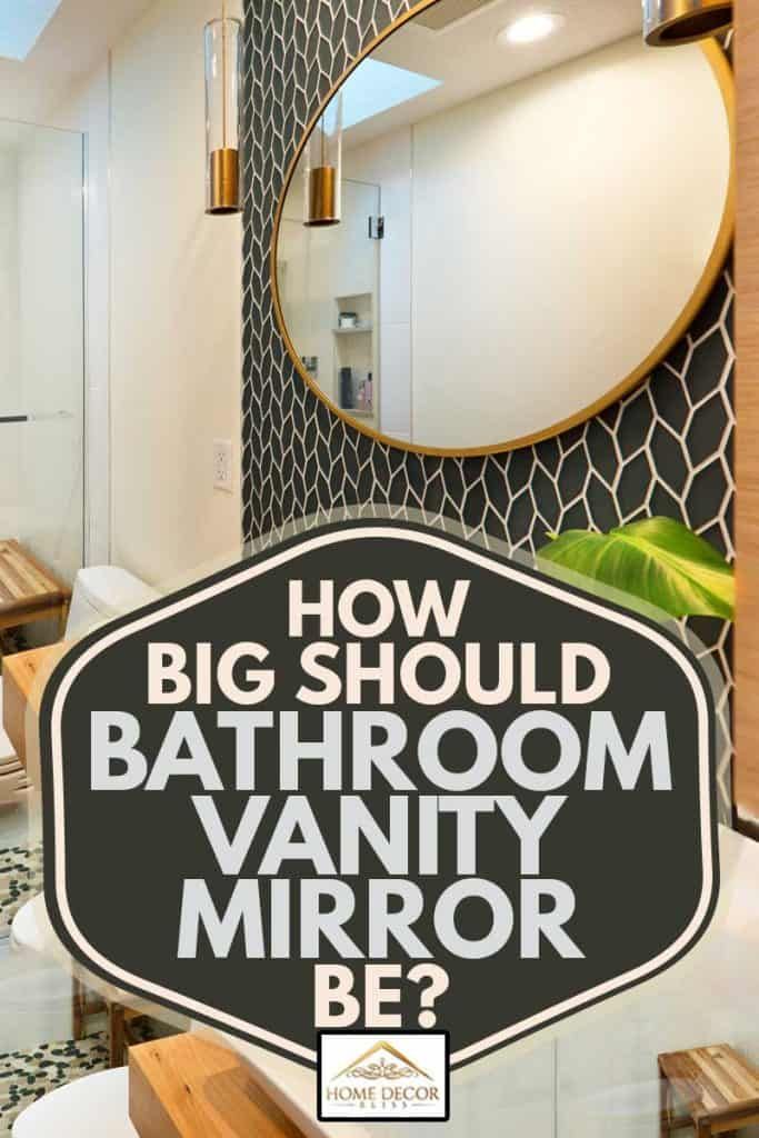 a bathroom mirror with the words how big should bathrooms vanity mirror be? on it