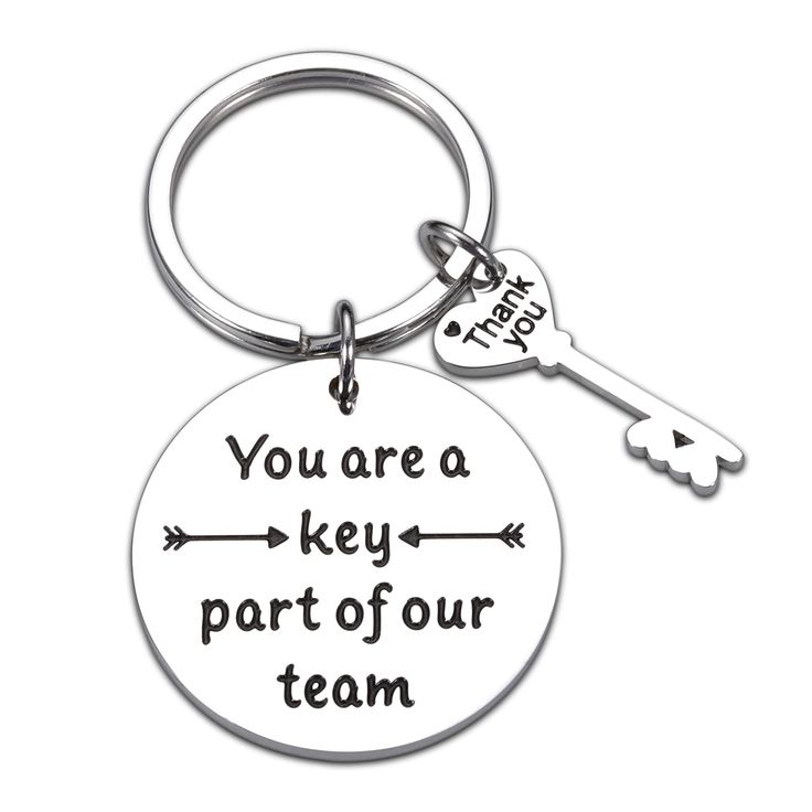 a keychain with the words you are a key part of our team on it