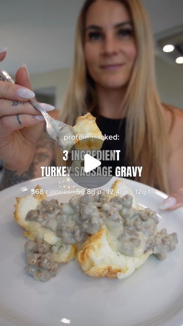 a woman is eating some food on a plate with a spoon in her hand and the caption reads 3 ingredients turkey sausage gravy