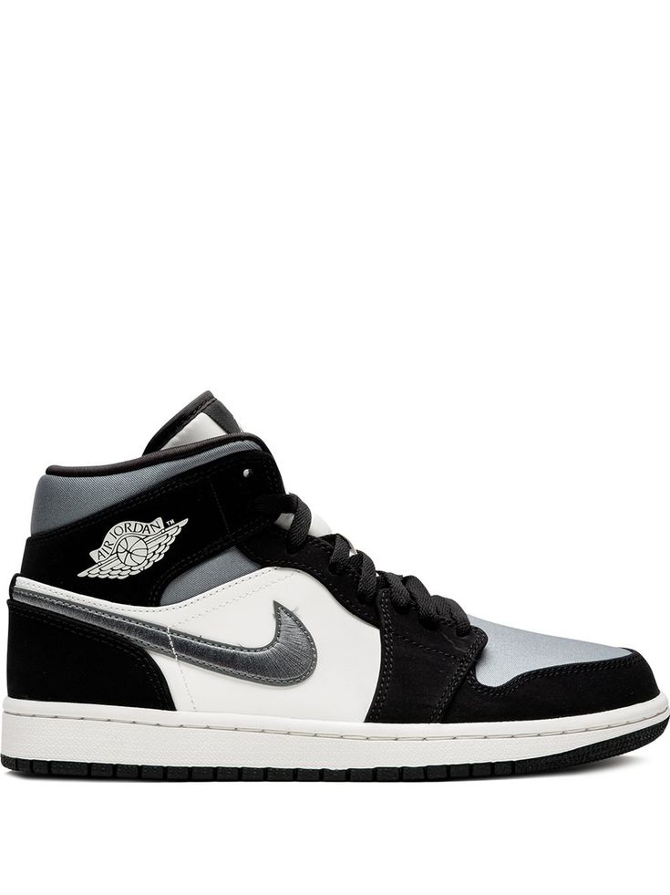 the air jordan 1 mid is available in black, white and grey colorways