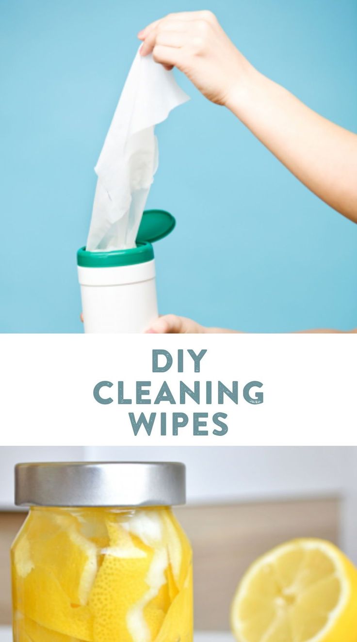 a jar filled with lemons and cleaning wipes