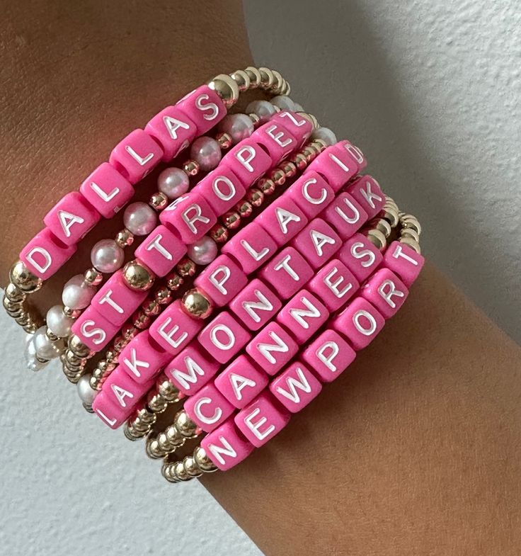 Say hello to our brand-new Destination Bracelets. These babies are all about fun and flaunting, dipped in hot pink color that's impossible to miss. Each bracelet rocks the names of our top-pick city spots and resort destinations.
This bracelets will not tarnish and you can wear this in the pool or sea.
3mm beads | Available in 6.5" or 9.5" (stretchy)
Please note that each piece is custom made with your city names and final sale. Adjustable Pink Bracelets With Letter Beads, Pink Letter Beads Name Bracelet, Custom Name Pink Jewelry For Everyday, Pink Stackable Beaded Bracelets For Summer, Stackable Pink Beaded Bracelets For Summer, Everyday Pink Custom Name Jewelry, Custom Name Pink Adjustable Bracelets, Pink Custom Name Adjustable Bracelet, Custom Name Adjustable Pink Bracelet