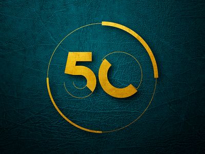 the 50th anniversary logo is shown on a green leather surface with gold lettering and a circular design