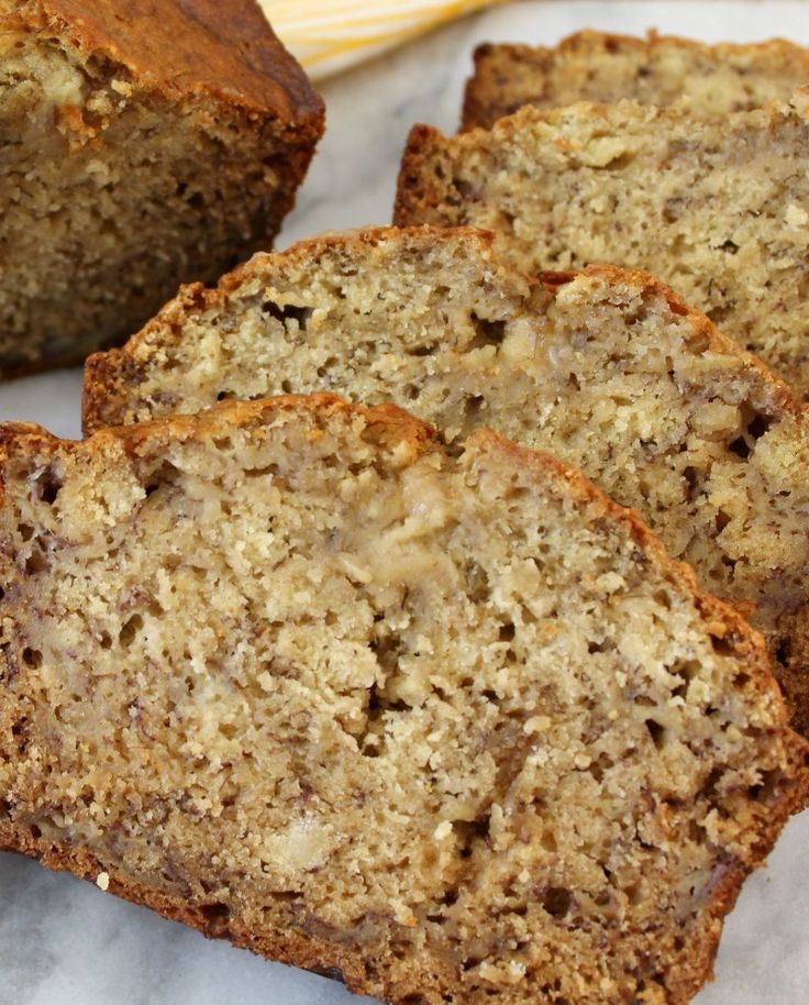 slices of banana bread sitting on top of a table