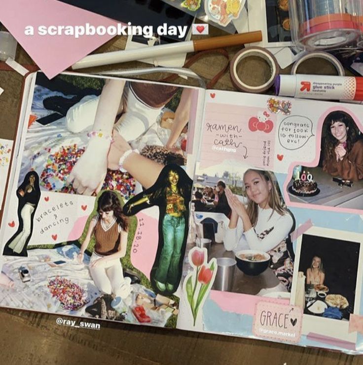 an open scrapbook with pictures and crafting supplies