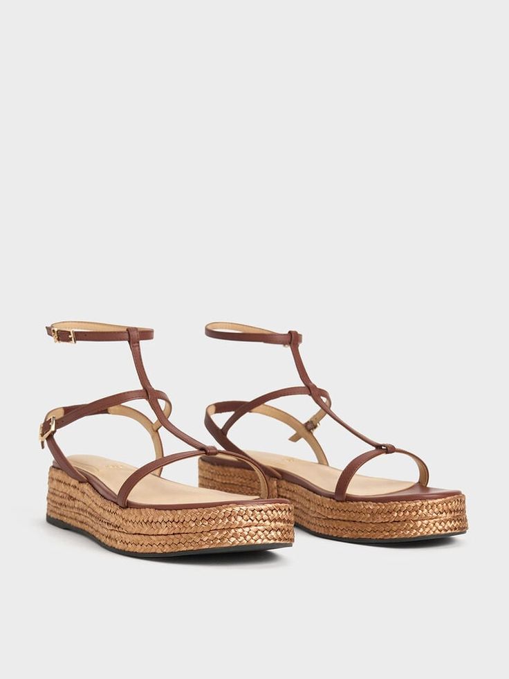 Espadrille sandals are a summer staple, and you will get lots of wear out of this new-season take. Featuring a distinctive T-bar design, the straps create clean lines that accentuate and flatter the feet. In match-all dark brown, they will complement your summer ensembles with ease. Flatform soles also ensure walkability, making this a stylish and wearable pair at the same time. Mark And Spencer, Espadrilles Outfit, Brown Espadrilles, Casual Basics, Online Shopping Shoes, Charles Keith, Espadrille Sandals, Trendy Sneakers, Summer Staples