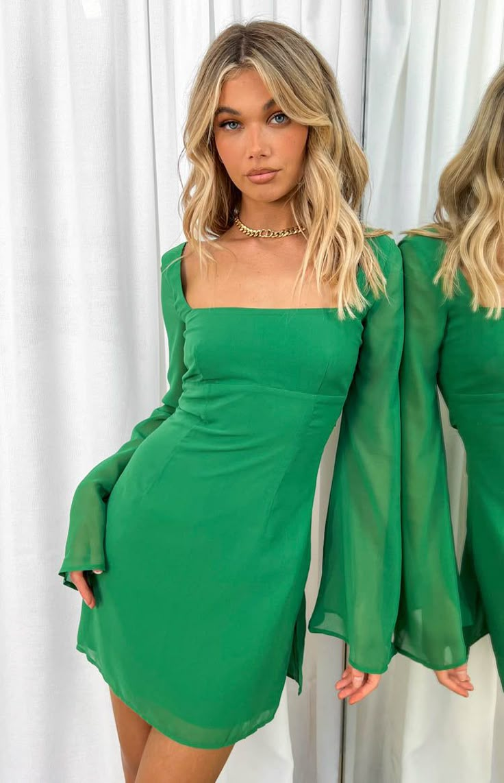 * Green Long Sleeved Mini Dress () 
 * We are OBSESSED with this pop of colour! Add a pair of your fav mules () and you have the perfect dinner date fit! 
 * 
 
 * Mini Length 
 * Mesh like non-stretch material 
 * Square neckline 
 * Body lined 
 * Flared unlined sleeves 
 * Criss Cross tie up at back 
 * Slight flare from the hips down 
 * Mid weight material Casual Green Mini Dress, 18th Birthday Fits, Semi Formal Garden, Formal Summer Dresses, Comfy Outfits Spring, Dresses For Hoco, Carol Dress, Hoco Dress Inspo, Christmas Eve Outfit