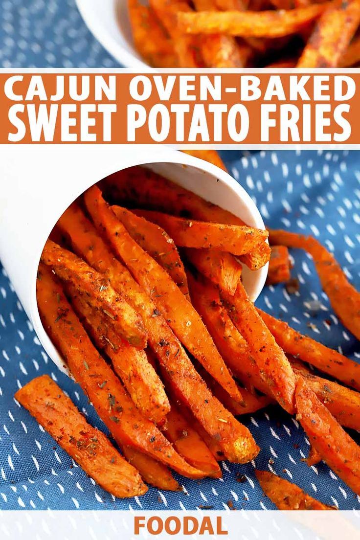 baked sweet potato fries in a white bowl on a blue tablecloth with text overlay