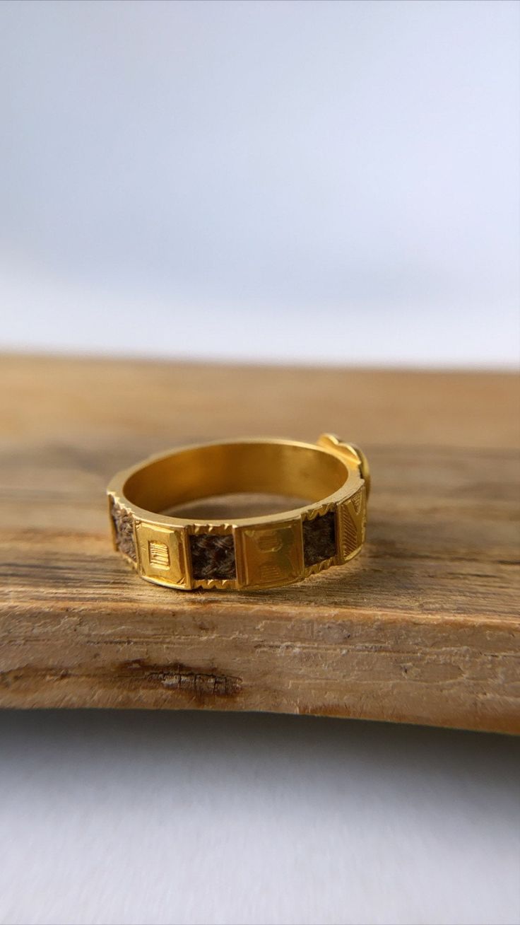 This is a beautiful antique mourning ring set in 18ct gold and dated from the Edwardian period. With woven hair covering the shank, interspersed with the letters MEMORY and a gold heart right in the centre with the initials A.P engraved on it. It's in very good condition with minor wear commensurate with age - there is some small engraving loss in the square of letter Y (as seen in photo). Crafted in solid 18ct gold, it has acquired a wonderful patina to it. Size: P/US7.5 (not resizable) Fully h Victorian Gold Engraved Ring With Decorative Band, Victorian Gold Engraved Ring, Victorian Engraved Yellow Gold Ring For Ceremonial Occasion, Victorian Gold Engraved Etched Ring, Victorian Gold Etched Engraved Ring, Victorian Style Gold Engraved Ring, Victorian Gold Engraved Promise Ring, Victorian Yellow Gold Etched Rings, Victorian Etched Gold Engraved Ring