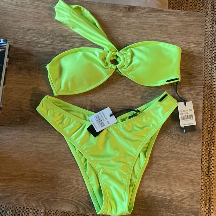 Two Piece Bikini. Brand New With Tags. No Longer Needed. Material Is Nylon Color-Lime Green Bust-35.5" - 36" Green Nylon Swimwear For Party, Green Nylon Swimwear For Spring, Green Swimwear For Spring Party, Spring Party Green Swimwear, Green Spring Party Swimwear, Kylie Swimsuit, Pacsun Bathing Suits, Kylie Green, Kylie Swim