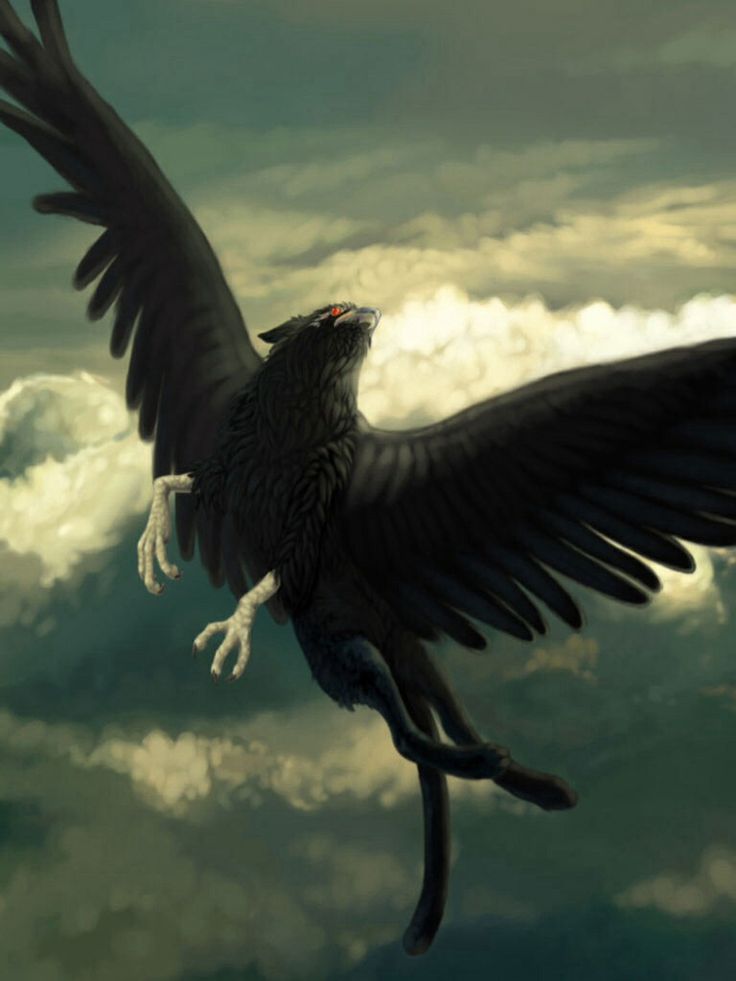 a large bird flying through the air with its wings spread out in front of clouds