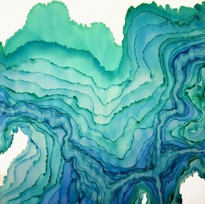 an abstract painting with blue, green and white swirls on the paper that looks like water