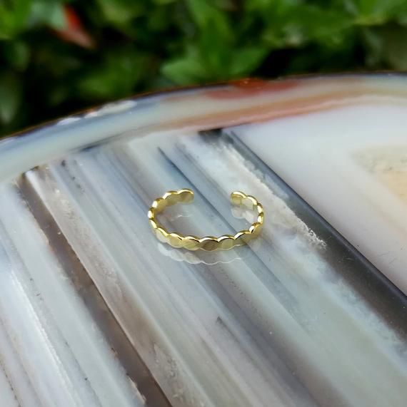 Ear Cuff, conch cuff, ear wrap, ear band, 14K solid yellow gold  1.8mm wide ear cuff. No piercing required! Measures: 0.5"   13mm width 1.8mm (Available in a smaller size upon request, please convo me) The perfect gift for you or your loved ones.Follow us on:Instagram @sampsonjewelryFacebook @sampsonjewelryPinterest @sampsonjewelryTweet on Twitter @sampsonjewelryTo save for later, click Add Item to FavoriteWith any questions or comments feel free to convo me. Thank you for shopping with Sampson Conch Cuff, Ear Band, Ear Lobe Piercings, Lobe Piercing, Gold Ear Cuff, Nameplate Necklace, Nose Rings Hoop, Conch Piercing, Classic Earrings