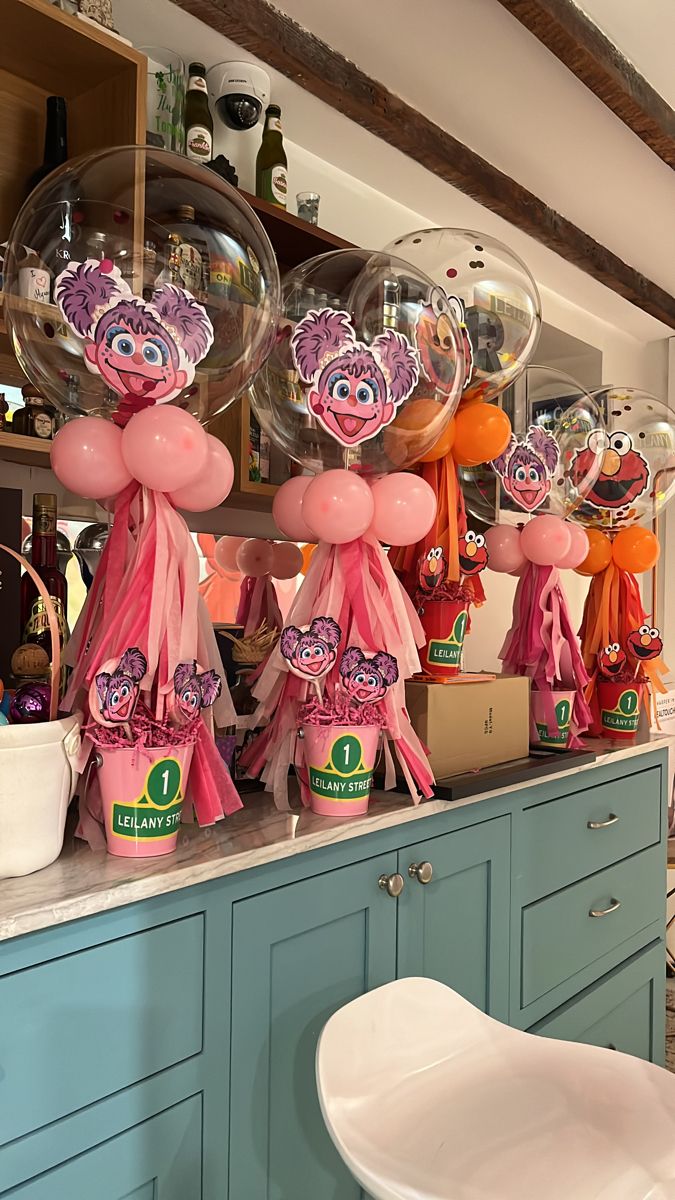 balloons and decorations are on display in the kitchen