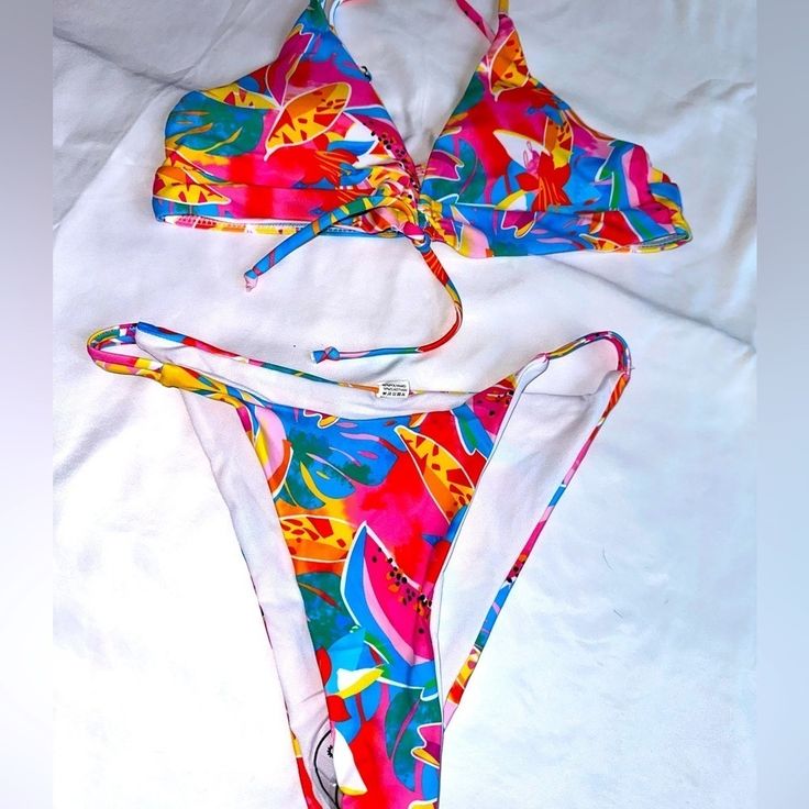 This Is A Brand New Never Worn Bikini. Not Sure Of The Fit Cuz I Never Tried It On. Brand: Shein Condition: Brand New Size: Medium (Refer To Photos) Color: Multi Material: Polyester/Elastane Please Refer To All The Photos No Try Ons No Extra Measurements Thanks Happy Poshing Multicolor Vibrant Print Triangle Top Swimwear, Colorful Triangle Top Swimwear For Summer, Colorful Triangle Top Summer Swimwear, Pink Swimwear With Vibrant Print For Poolside, Pink Vibrant Print Swimwear For Poolside, Fitted Tropical Colorful Swimwear, Fitted Colorful Tropical Swimwear, Pink Tropical Swimwear With Vibrant Print, Tropical Pink Swimwear With Vibrant Print