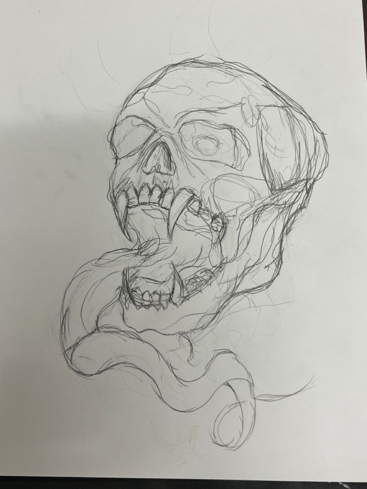 a drawing of a skull with its mouth open