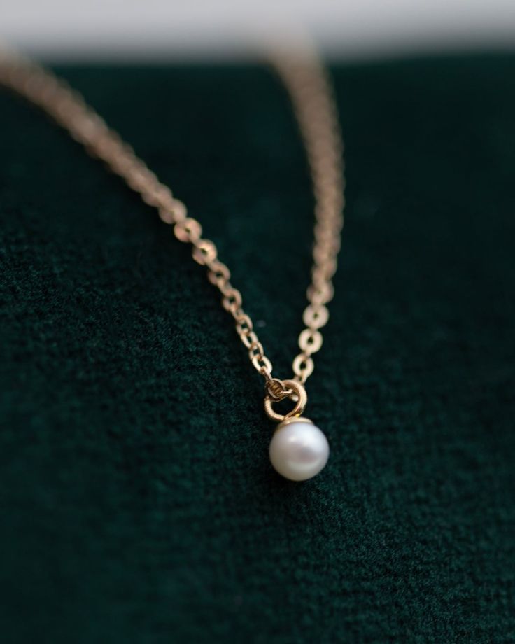 This Mini Pearl Pendant Necklace is the perfect complement for your evening wear or casual wardrobe. Crafted from 14k gold, this delicate necklace features a small cultured pearl, lending it a minimalist and elegant look. With this classic and versatile accessory, you're sure to make a statement. Pearl size: 2.75-3mm 1 Classic Pearl Necklace With Delicate Chain, Minimalist 14k Gold Necklace With Pearl Pendant, Delicate Everyday Pearl Necklace In 14k Gold, Delicate Everyday 14k Gold Pearl Necklace, Dainty 14k Gold Pearl Necklace, Classic Rose Gold Pearl Necklace, Minimalist 14k Gold Pearl Necklace With Pearl Charm, Minimalist 14k Gold Necklace With Pearl Charm, Minimalist 14k Gold Pearl Necklace Gift