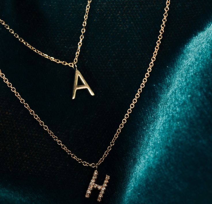 Say it in purest gold with our Classic Gold Letter Necklace. You can send a covert message or keep a special someone close to your heart in golden style.Length: 1cmWidth: VariesThickness: 1.5mmSpecs Description: Each letter of the alphabet is emblazoned in gold, hanging from a gold chain secured with lobster clasp and two jump rings for size adjustments. Gold Letter Necklace, Mini Gold, Gold Letter, Letter Charm, Cute Necklace, Letter Charms, Gold Letters, Classic Gold, Letter Necklace