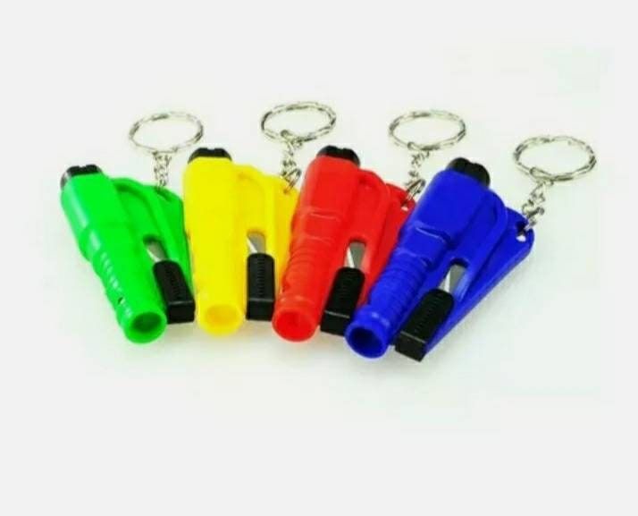 four different colored whistle key chains