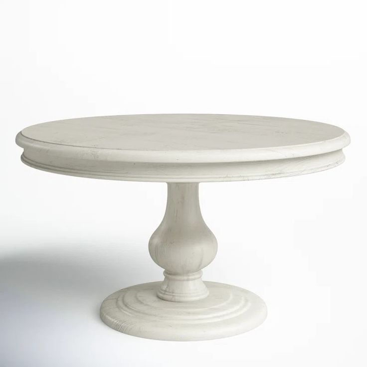 a white cake stand on a white background