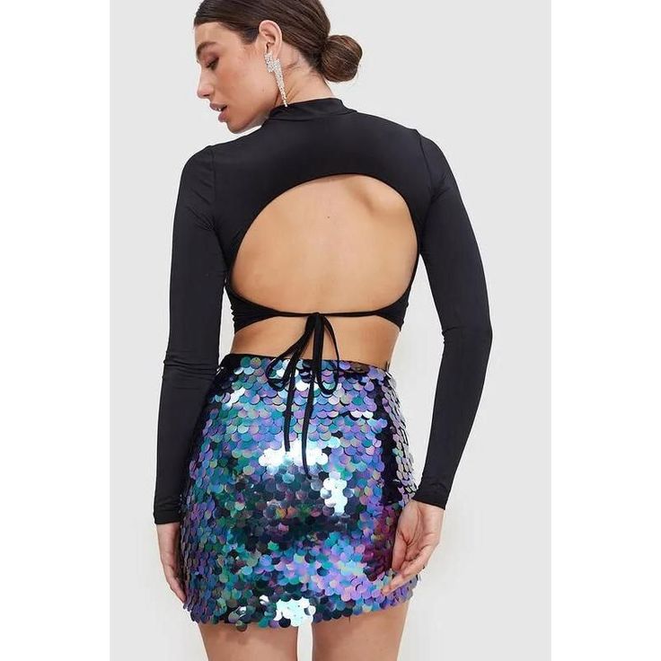 Unleash Your Inner Sparkle Step into a world of glamour and shine with our High Waist Glitter Sequin Mini Skirt, a perfect blend of style and comfort for the modern woman. Designed to turn heads, this skirt is your go-to piece for any season, ensuring you stand out in every crowd. Product Features Our skirt boasts a stunning sequined decoration on a solid, woven polyester fabric that catches the light beautifully. The straight silhouette paired with a flattering empire waistline accentuates your Stretch Shiny Bottoms For Party, Stretch Shiny Party Bottoms, Party Stretch Shiny Bottoms, Party Bottoms Shiny Stretch, Trendy Shiny Bottoms For Party, Disco Mini Skirt For Night Out, Disco Style Mini Skirt For Night Out, Trendy Shiny Party Bottoms, Fitted Sequin Mini Skirt