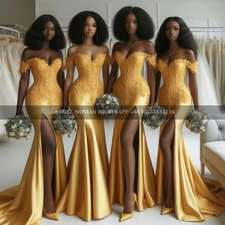 three women in gold dresses standing next to each other and one is wearing an off the shoulder