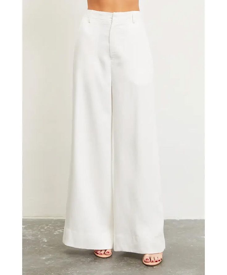 Go out in comfort with these gorgeous pants. The oversized flare makes it a great piece to pair with your basics. 100% Lyocell Chic White Flare Bottoms, Chic White Flare Pants, White Flare Pants For Spring, Spring White Flare Pants, Solid Flare Cotton Pants, Cotton Wide Leg Pants For Day Out, White Flared Wide Leg Cotton Pants, White Flare Wide Leg Cotton Pants, Summer Flare Wide Leg Pants With Pockets