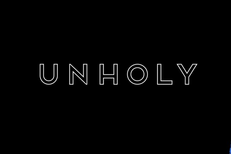 the word unholy written in white on a black background