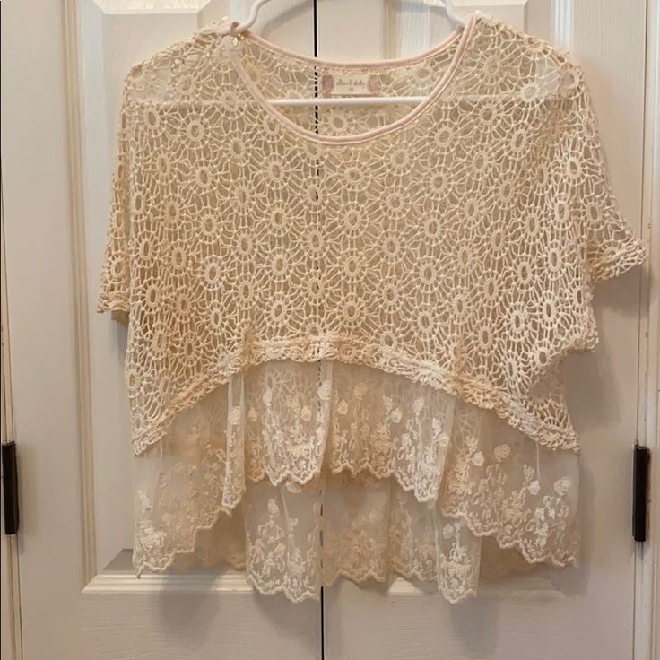 High-Low Crochet Top With Embroidered Ruffles From Altar�’d State. Never Worn. Loose And Flowy. Lace Tops With Lace Work For Spring, Spring Lace Crochet Top With Lace Work, Spring Crochet Lace Top With Lace Work, Short Sleeve Open Knit Crochet Top, Summer Lace Top With Lace Work, Casual Lace Patchwork Tops, Spring Lace Open Knit Blouse, Casual Tops With Lace Patchwork, Lace Crochet Top With Short Sleeves