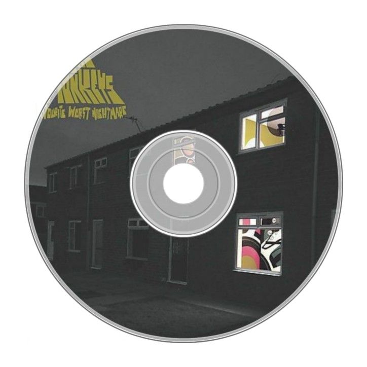 the cd is on display in front of a black and white building with yellow lettering