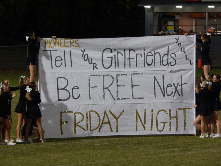 a group of cheerleaders holding up a sign that reads tell your girlfriends, be free next friday night