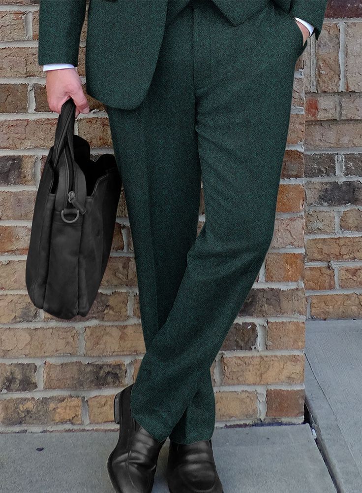 Draw a stroke of genius by pulling off our Highlander Melange Green Tweed Pants. Afterward, maintain a prestigious character with a pure wool cloth, which exhibits sturdy, soft and evenly plush accents with gorgeous green hues. Also, with the help of precision tailoring, these pants will firmly put you at the top of sartorial stacks with sharp cuts and well- proportioned stance that stand the test of time without lacking in style to convey a bold persona while attending a winter reception or an