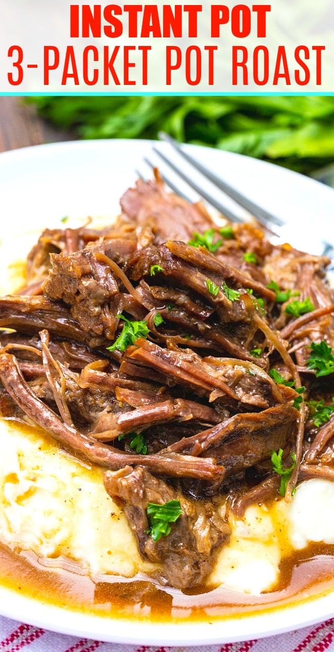 instant pot roast with mashed potatoes and gravy on a white plate next to green beans