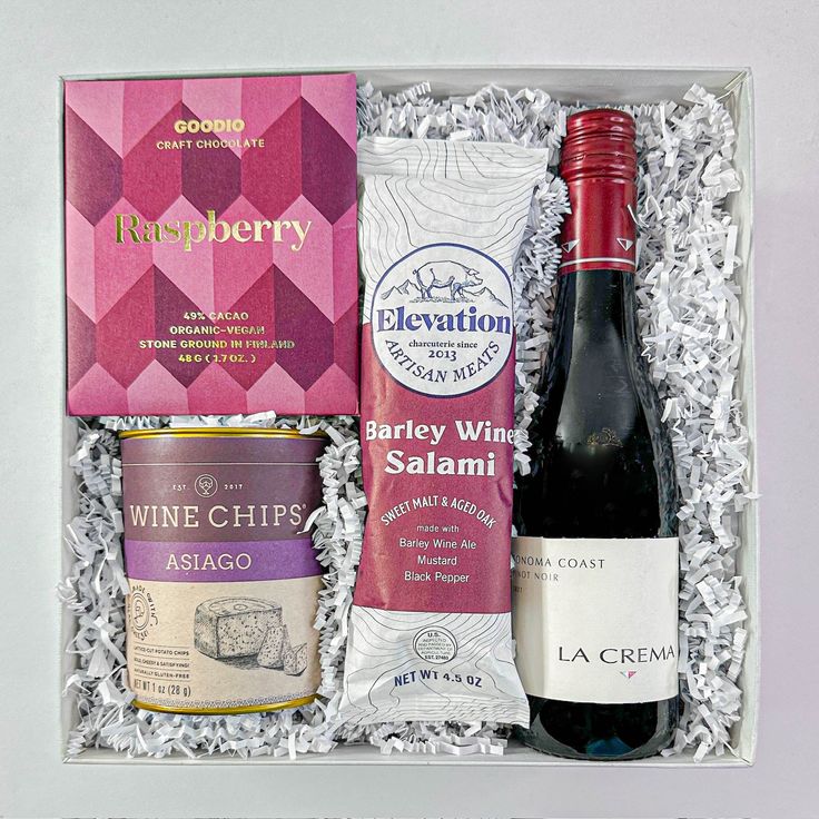 Gift a taste of sweet and savory with this beautiful red wine gift box. Perfect for any occasion, whether you're gifting it to someone for their birthday, sending a simple thank you, or landing a large client - they're sure to enjoy this gift box! This gift box includes:La Crema Pinot Noir [375mL]Raspberry Chocolate BarWine Chips [1oz]Barley Wine Salami Each gift comes wrapped in our beautiful white box, tied with a ribbon and hand written gift message. ** You must be 21 years of age or older to Voluspa Candles, Wine Gift Box, Tyler Candle Company, Simple Thank, Raspberry Chocolate, Strawberry Wine, Sweet Grace, Wine Gift Boxes, Relaxation Gifts