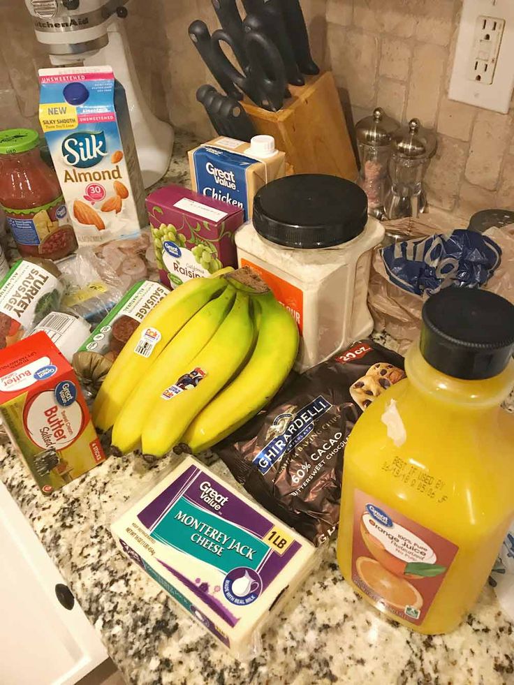 bananas, milk, and other ingredients are on the counter