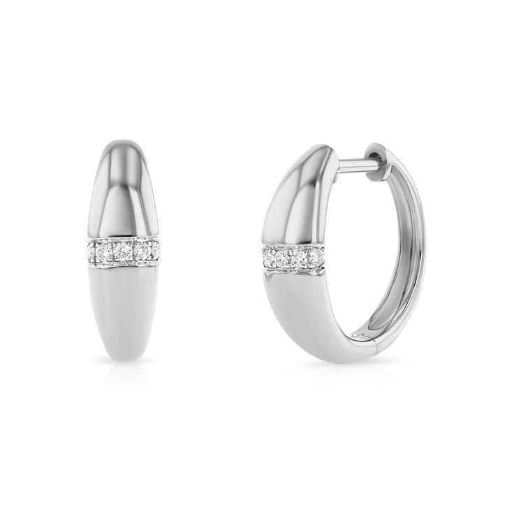 The diamond line dome hoops are a mid-size hoop earrings with a bit of sparkle. Perfect for layering with our Solitaire Diamond Dome Hoops or on their own as an everyday earrings. The straight post makes them super easy to put in and clicking to close lets you know they are secure to wear. Lightweight and comfortable, we love these hoops!