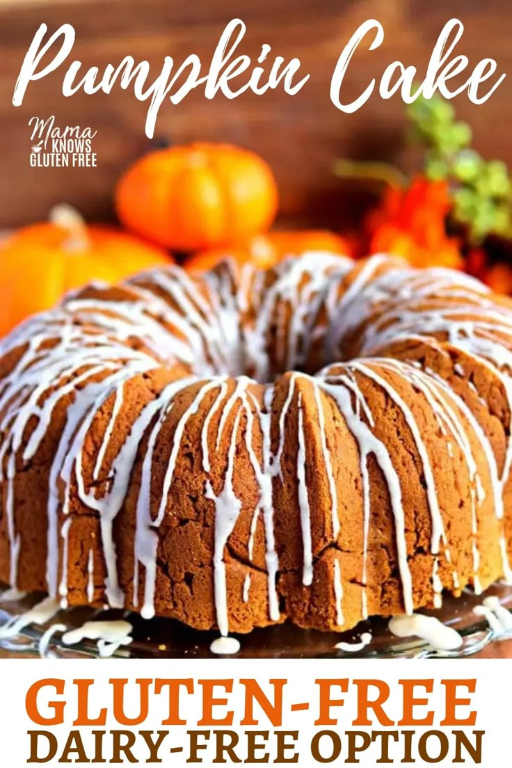 a pumpkin bundt cake with white icing on a plate