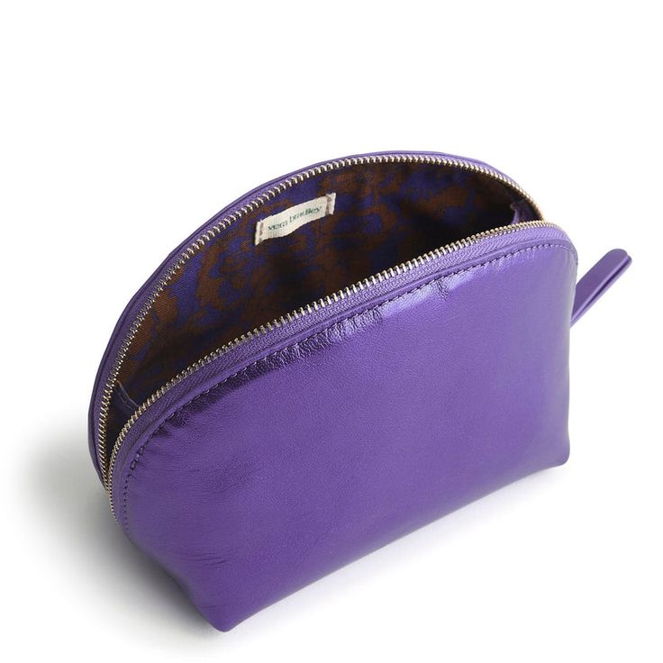 Our Mini Dome Cosmetic is perfectly sized to fit in your purse, handbag, or travel tote, making it ideal for carrying your essential makeup items on the go without taking up too much space. Whether you're touching up your makeup during the day or packing light for a weekend getaway, our compact bag offers the perfect solution for keeping your beauty essentials close at hand. Vera Bradley Mini Dome Cosmetic Bag in Purple Portable Round Case Travel Bag, Versatile Round Case Travel Bag, Round Case Travel Bag With Zipper Closure, Purple Travel Wallet With Zipper Closure, Purple Wallets With Removable Pouch For Everyday Use, Travel Wallet With Zipper Closure In Purple, Purple Pouch Coin Purse For Everyday Use, Trendy Cosmetic Bag With Removable Pouch For Errands, Round Case Bag With Removable Pouch For On-the-go