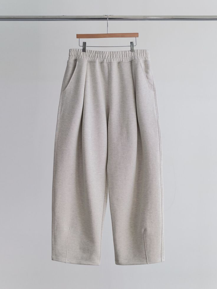 Editor's NotesThese sweatpants are made of fluffy heavy fabric which is giving a comfortable feel.- Banding pants- Pockets at the side- Tucks on the hem- Fluffy Heavy sweat fabric- Basic and comfy itemMeasurements(in.)1/2- Total length: 41.33 / 42.12 in.- Waist: 14.56 / 15.35 in.- Thigh: 15.35/ 16.14 in.- Front rise: 14.56 / 15.35 in.- Hem: 10.23 / 10.62 in.Composition & Care- 72% Cotton, 27% Polyester- Wash in cold waterDesigner- by LIEU HOMME Comfortable Wide-leg Sweatpants With Pockets, Winter Solid Color Wide-leg Sweatpants, Comfortable Oversized Bottoms With Elastic Cuffs, Winter Beige Relaxed Fit Sweatpants, Cozy Bottoms With Side Pockets For Everyday, Loosely Fitted Wide-leg Sweatpants For Winter, Winter Wide-leg Sweatpants With Pockets, Plain Winter Loungewear Pants, Winter Loungewear Plain Pants