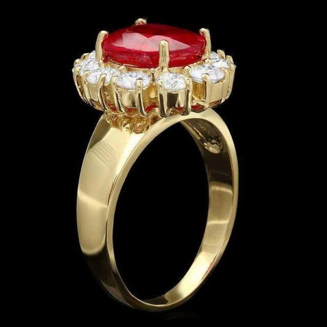 For Sale on 1stDibs - 4.60 Carats Impressive Red Ruby and Natural Diamond 14K Yellow Gold Ring Total Red Ruby Weight is: Approx. 3.40 Carats Ruby Measures: Approx. 10.00 x 8.00mm Gold Wrap Ring, Gemstone Diamond Ring, Gold Wrap, Emerald Cut Rings, Etsy Gold Ring, Gold Ring Stack, Large Ring, Leaded Glass, Red Ruby