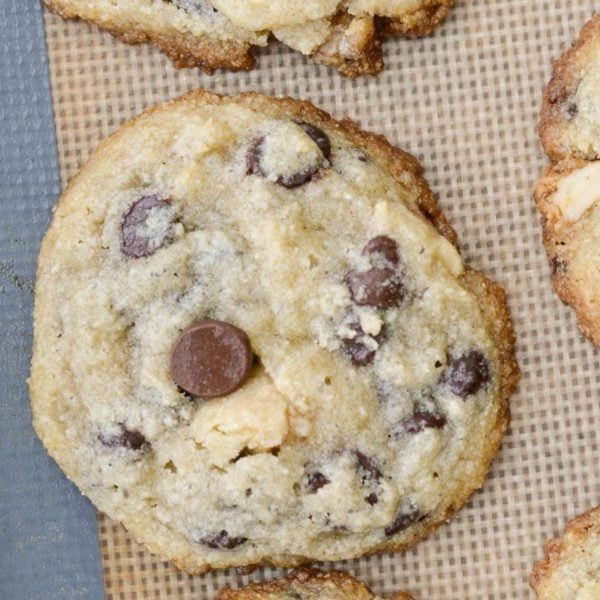 chocolate chip cookies on a baking sheet ready to be eaten